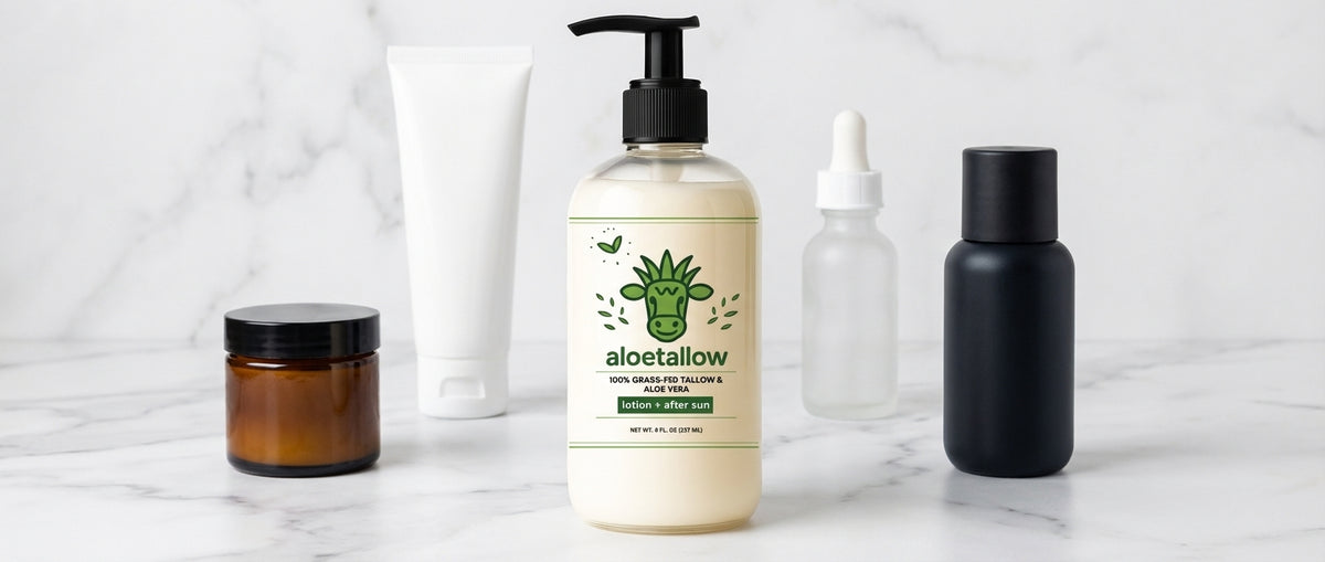 Aloetallow bottle surrounded by 5 tallow lotion options on marble