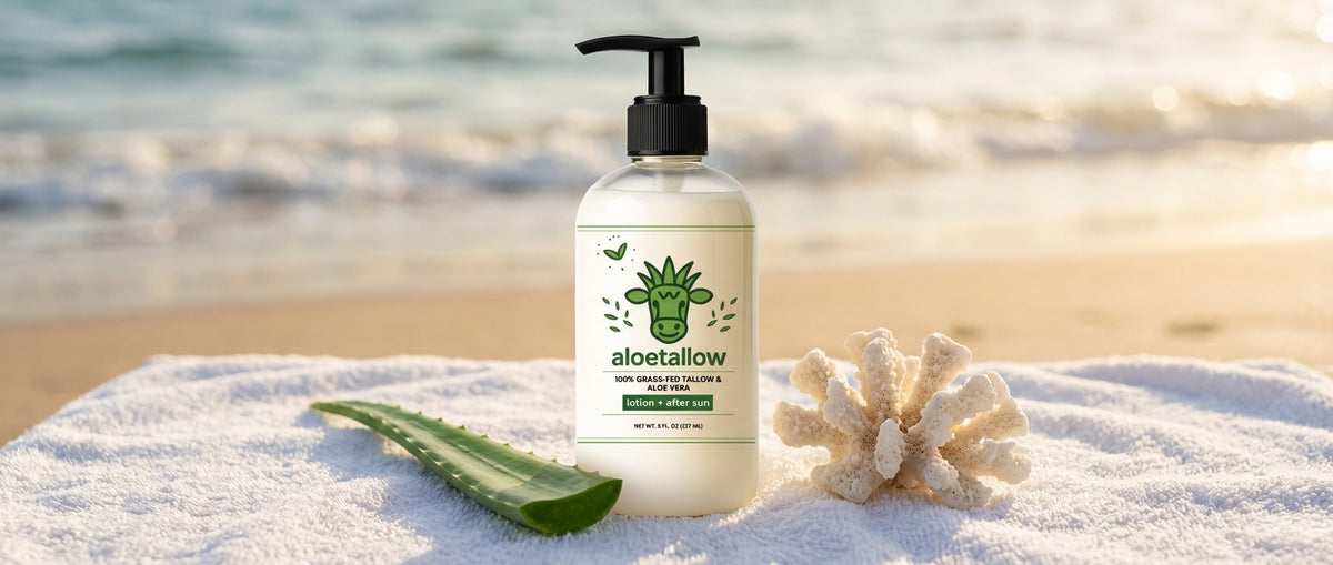 Aloetallow bottle on beach towel with aloe vera and coral
